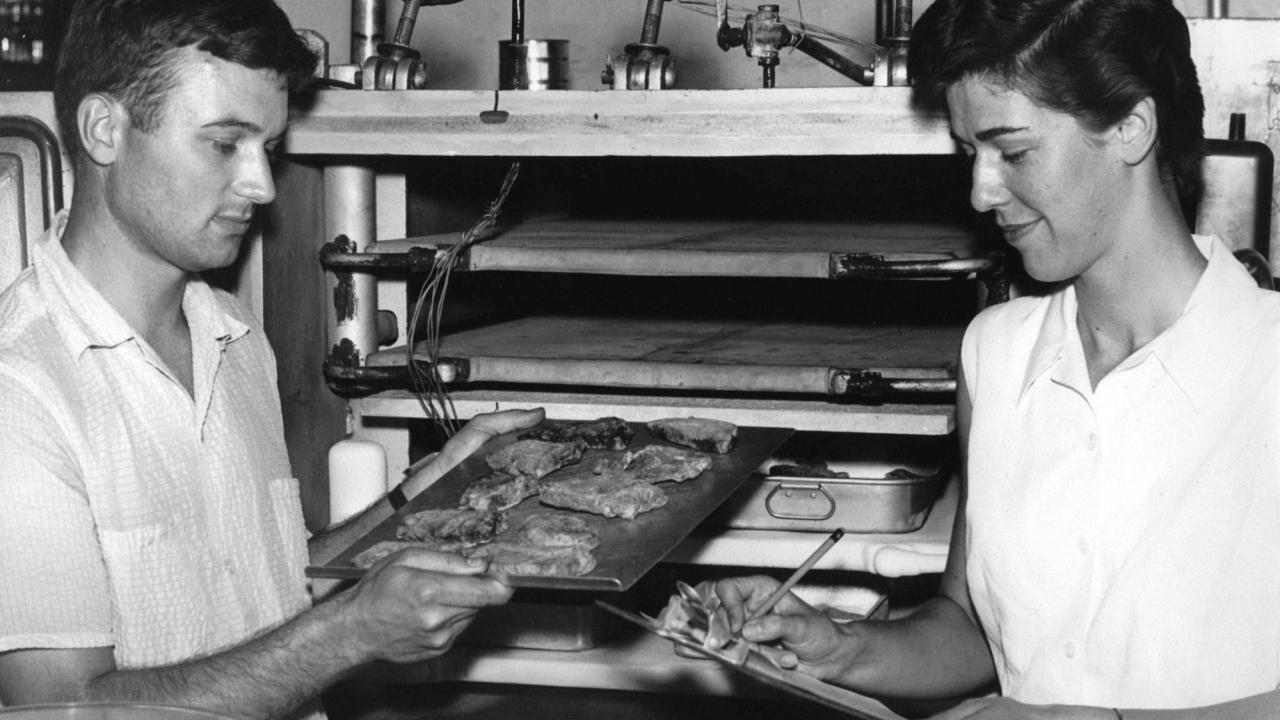 Al Tappel and student in front of the first freeze dryer in the processing laboratory of Cruess Hall; early 1950s. Courtesy of the Department of Food Science and Technology.