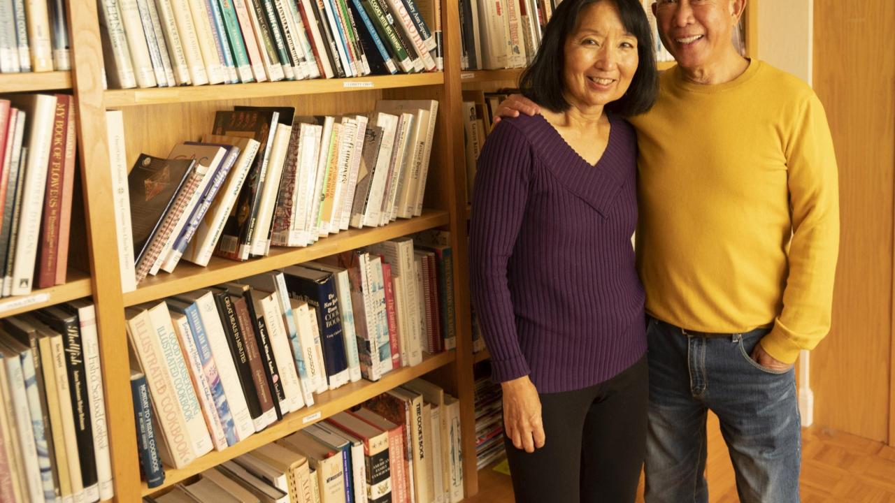Martin Yan and his wife Susan in their home in December 2021. (Gregory Urquiaga, UC Davis)