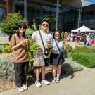 Three people with ice cream and grapevines at Picnic Day
