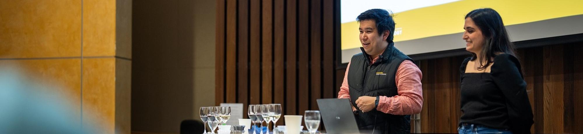 Ph.D. candidates leading a tasting
